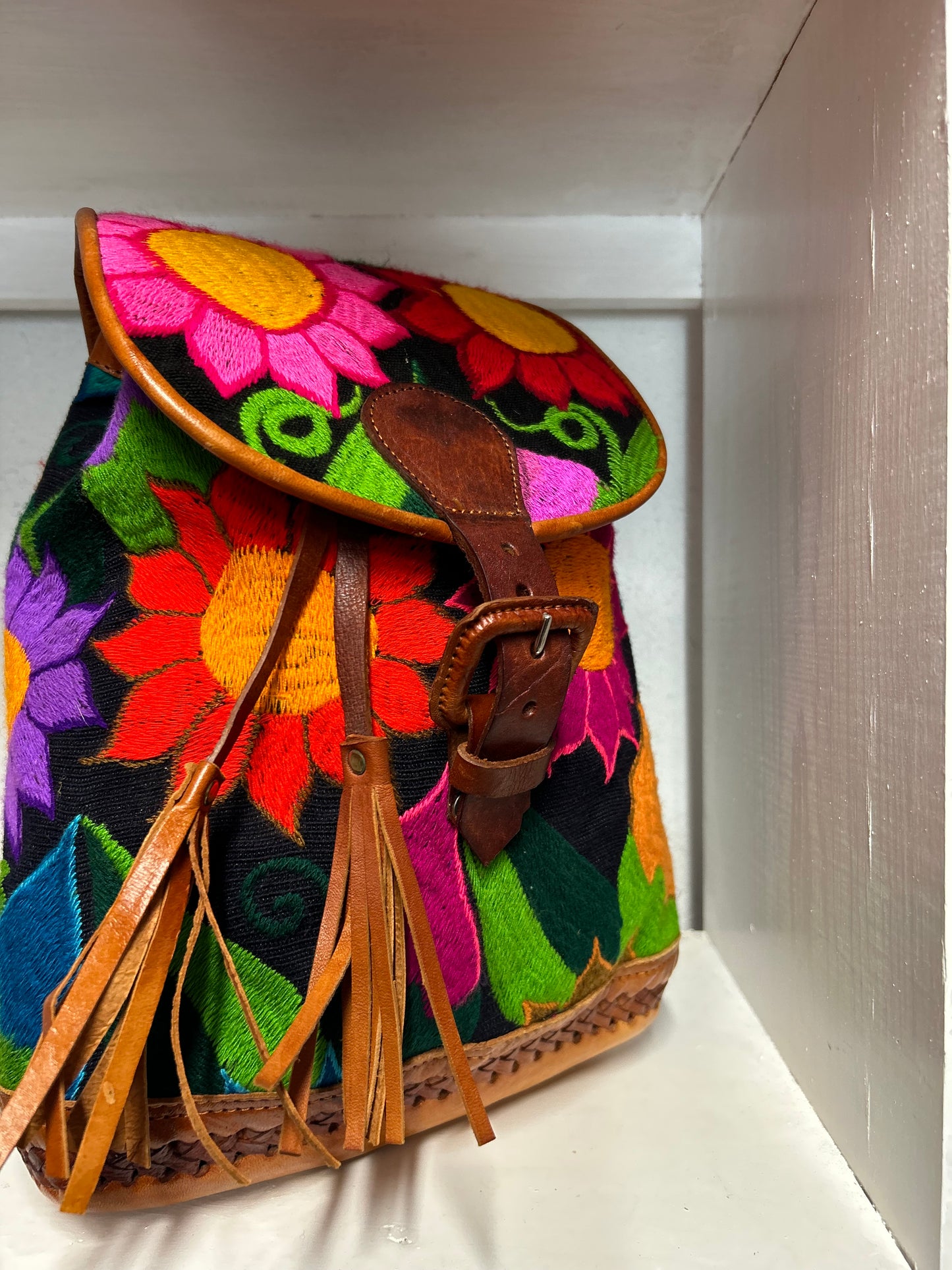 Leather embroidered backpack