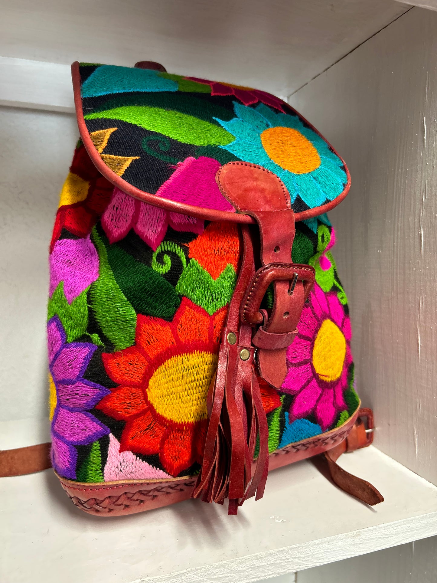 Leather embroidered backpack